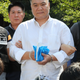 Chinese murder suspect Chen Guorui speaks to reporters after re-enacting his crime in Jeju, South Korea.